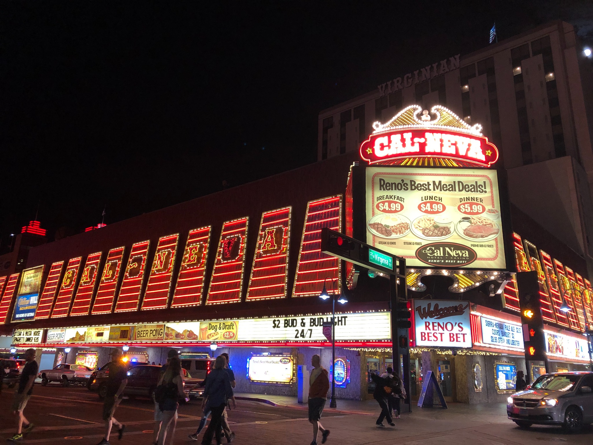 Club Cal Neva casino exterior illuminated at night on Virginia Street in downtown Reno.