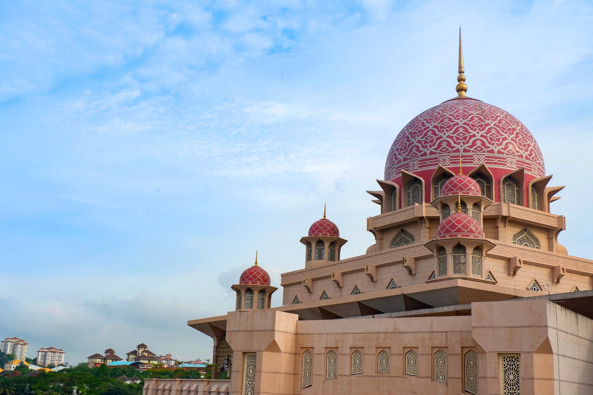 The pink dome and Islamic architecture of Putra Mosque in Putrajaya, near Kuala Lumpur.