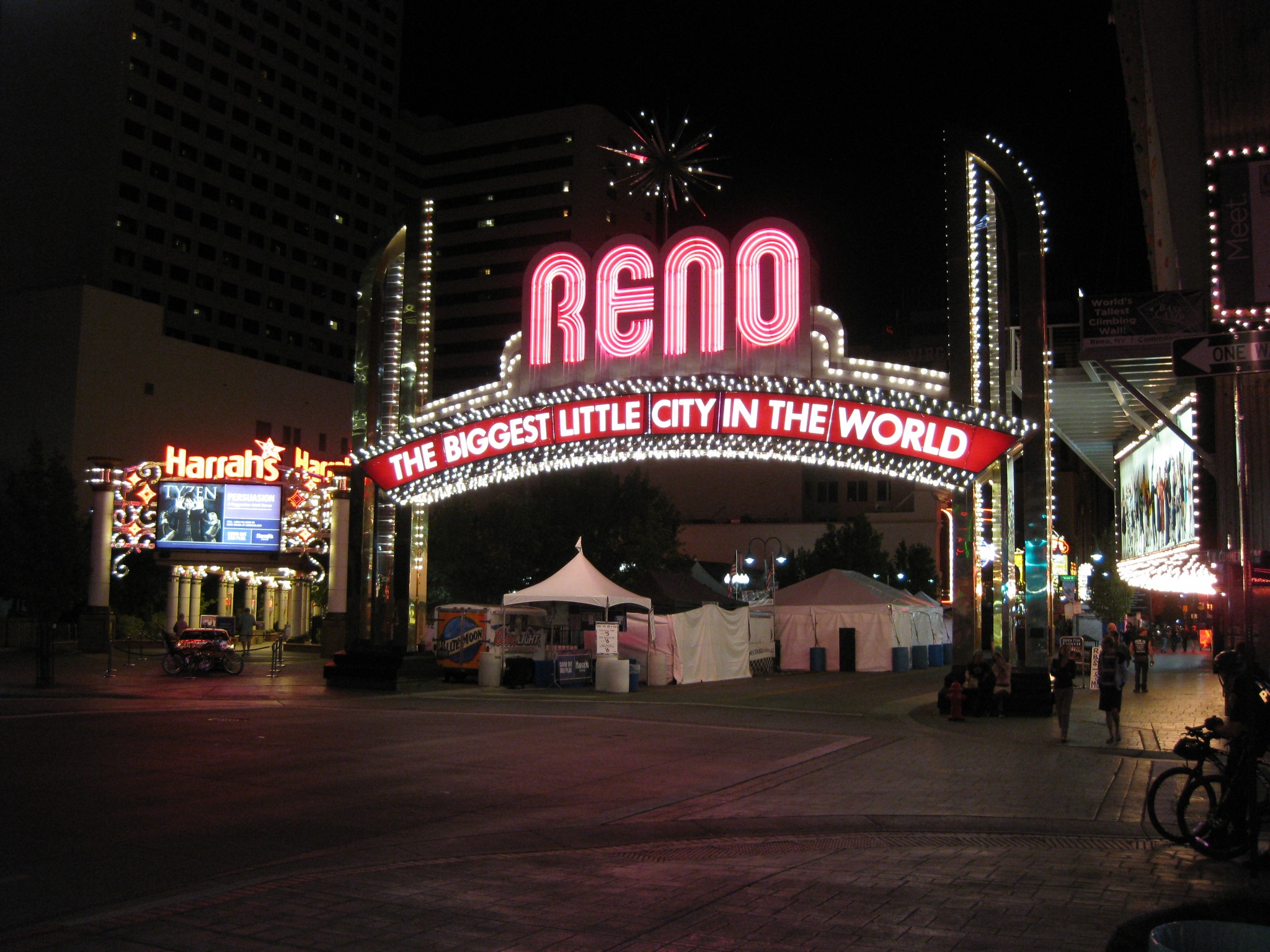 Illuminated Reno Arch over Virginia Street in downtown Reno, Nevada, at night.